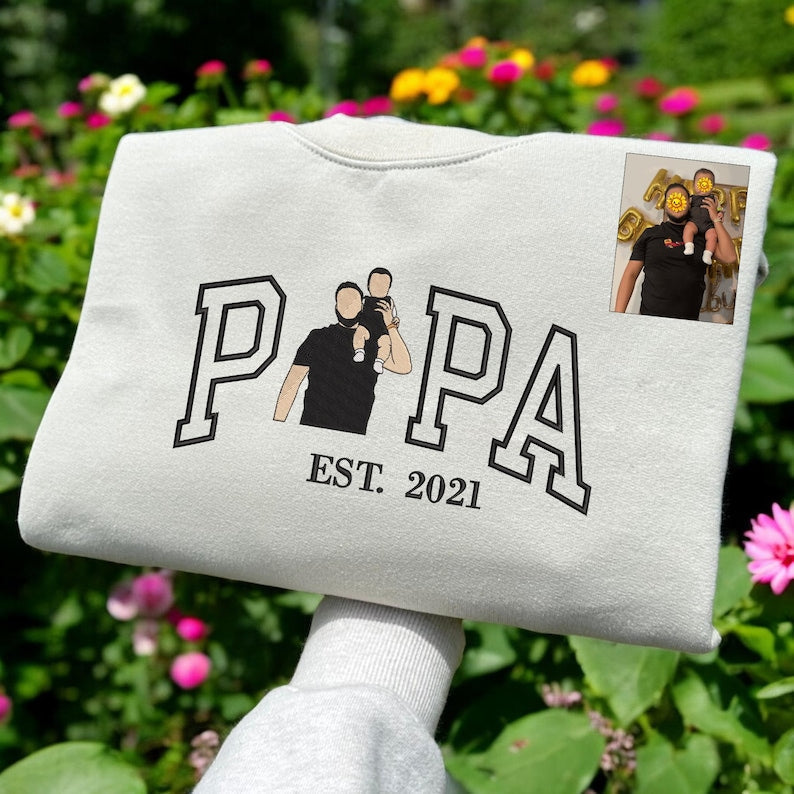 A Papa T-shirt with a photo and a sweatshirt separately embroidered with the portraits of the father and the child
