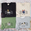 A Papa T-shirt with a photo and a sweatshirt separately embroidered with the portraits of the father and the child